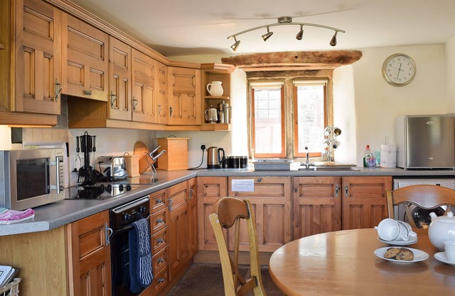 A Grade II listed, detached character cottage commanding spectacular views over Swaledale.