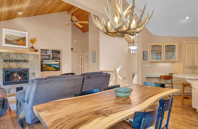 A modern rustic two story home with ac, private hot tub and near bike trails!