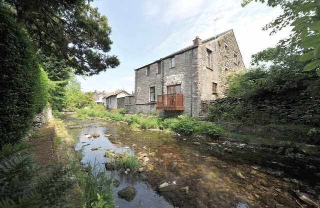 A RIVER RUNS BY, with a garden in Staveley