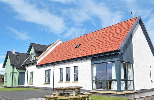 A rural property based on a working farm with wood burner.