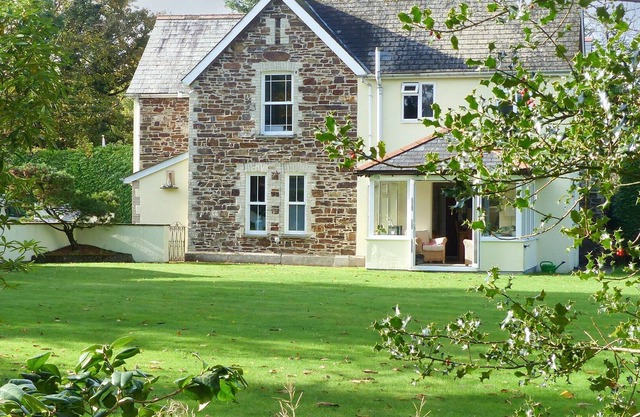 A rural retreat in a woodlands with large gardens.