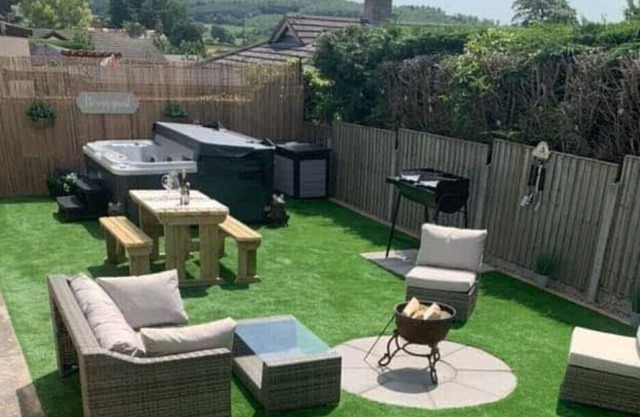 A two bedroom detached bungalow, dogs welcome, private secure garden