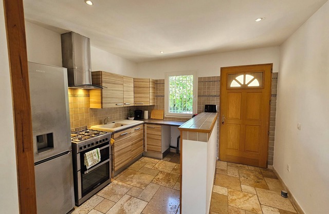 Air-conditioned house located 3 ms walk from the village with terrace and garden