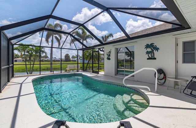 Airy Canal-Front 3BR Home with Heated Pool Minutes to Beaches, Golf & Southwest Florida Adventures