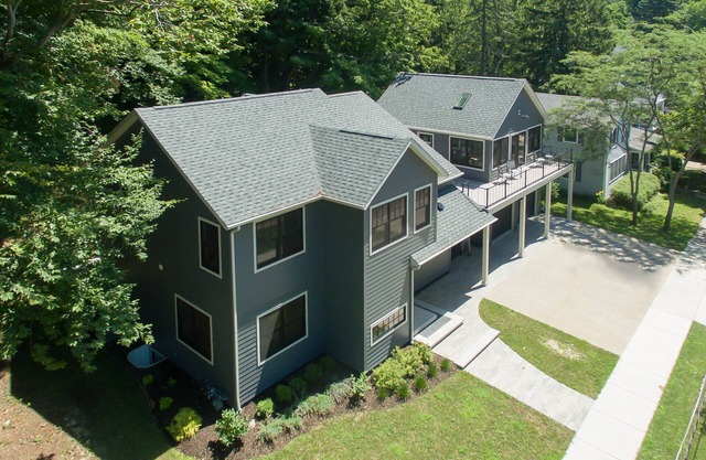 AMAZING NEWER HOME WITH LAKE VIEWS, steps away from shops and restaurants.