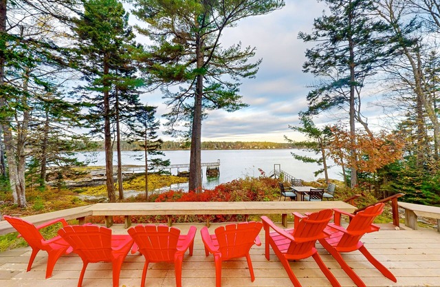 Amazing waterfront home with private deck, views, private dock, & fireplace