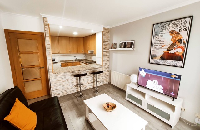 Apartment with garage next to the train and bus station.