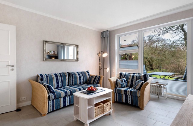 Apartment 'Am Südstrand' with Private Terrace, Shared Garden and Wi-Fi