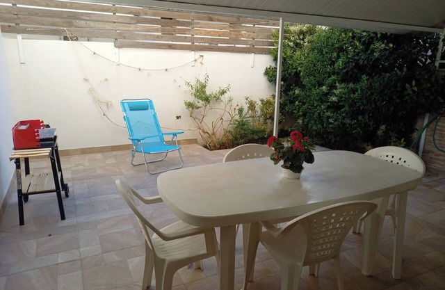 Apartment 'Blu' with Private Terrace, Private Garden and Air Conditioning