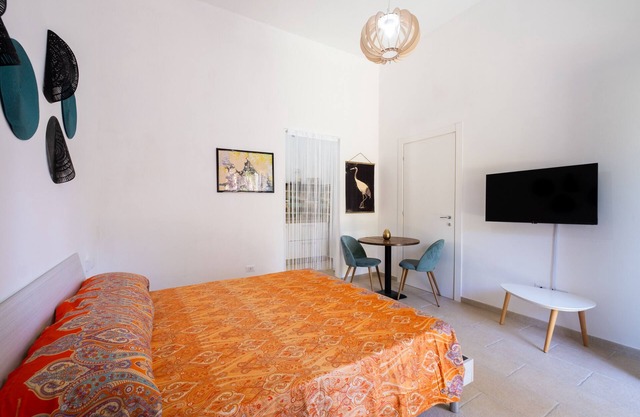 Apartment 'Mezzogiorno' with Shared Terrace, Wi-Fi and Air Conditioning