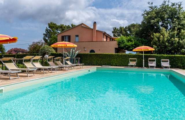 Apartment 'Principina tra mare e natura' with Shared Pool, Wi-Fi and Air Conditioning