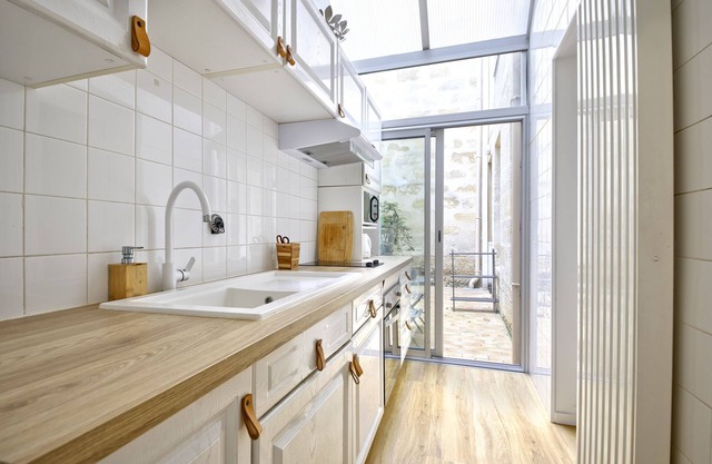 Apparemment 66 m Carrés Avec Patio , au Rez de Chaussée Dans un Immeuble Calme