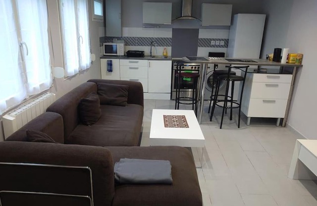 Appart T2 en fond de jardin