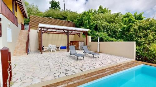Appartement accueillant avec piscine à Rivière-Pilote, 33 m²