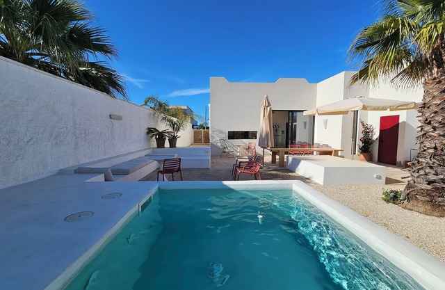 Aria villa house with swimming pool a few meters from the beach with fine sand