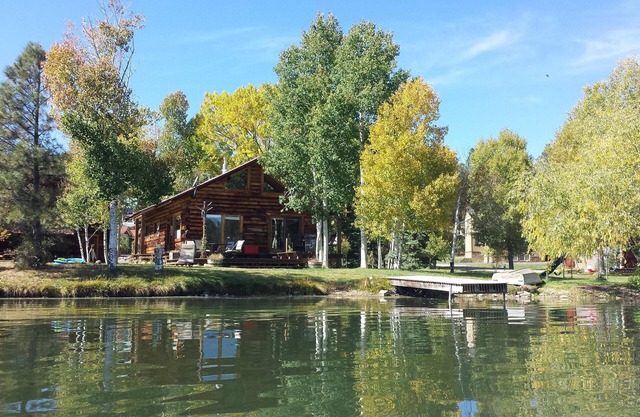 Authentic lakefront log cabin with mountian views. Ice off! Come fishing!