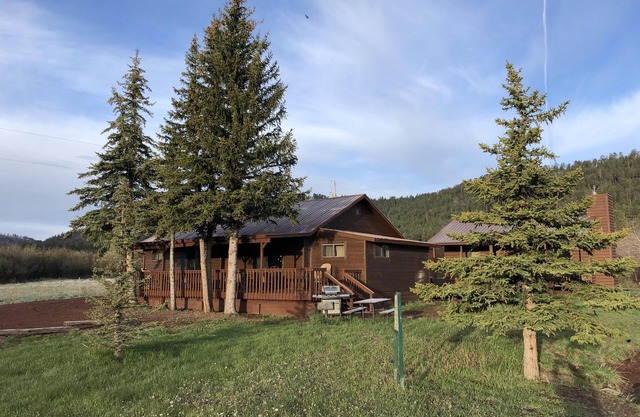 Awesome 4BR-2BA on Main Street! Huge porch, Stocked Trout Pond, Wood stove.