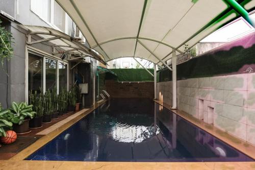 Ayur Kutir 9-BHK Retreat With Private Pool, Glass Pool, Garden, Gazebo, Jacuzzi & Spa room
