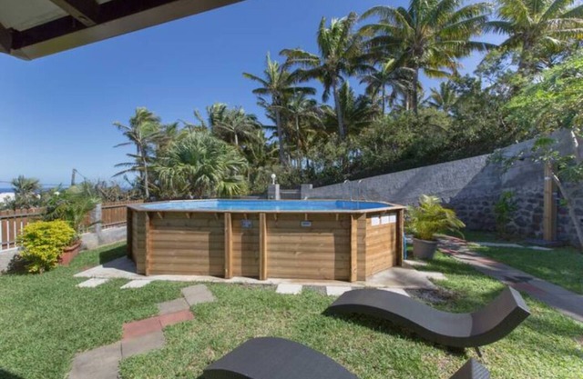 Badamier house with above-ground pool