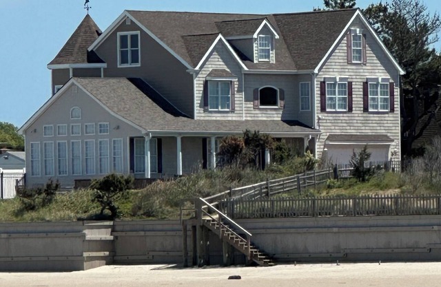 “Beach by day, sunset by night.” Pool any time, waterfront & beach front