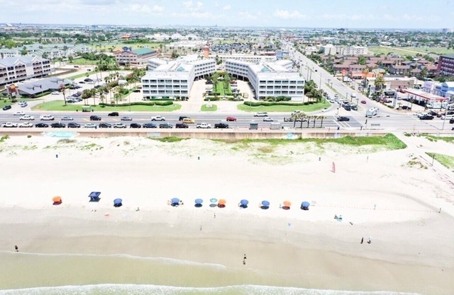 Beach Front Condo - beach and restaurants - just a walk away!