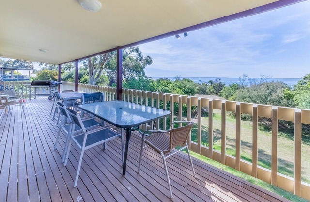 BEACH FRONT HOUSE with extensive water views, large deck and outdoor space