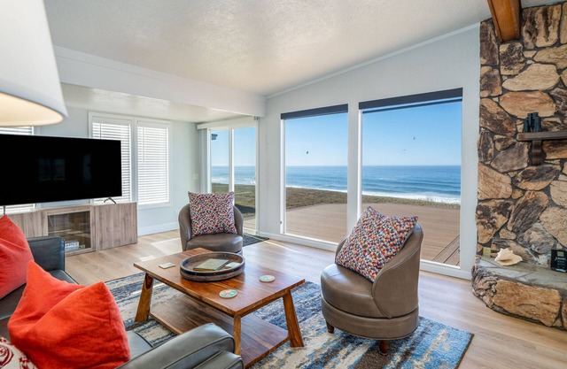 Beachfront home just steps to the sand with sweeping views from your deck!