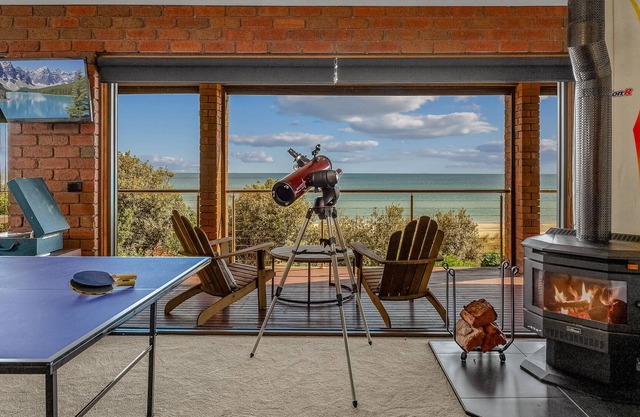 Beachfront home with direct beach access and 180 degree bay views!