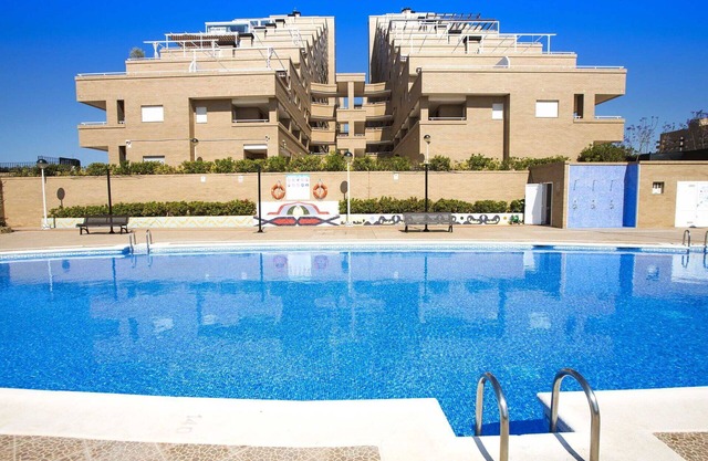Beautiful apartment for 4 people with A/C, pool, TV, terrace and pets allowed