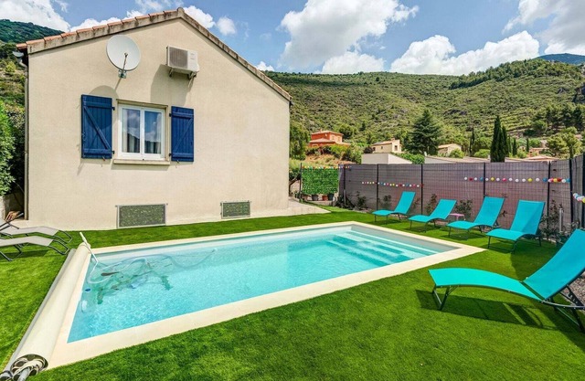 Beautiful holiday home in Roquebrun with swimming pool