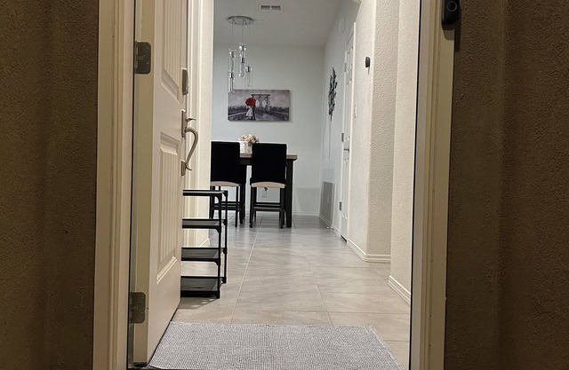 Beautiful modern new home centrally located & 7 minutes from SAF Airport with AC