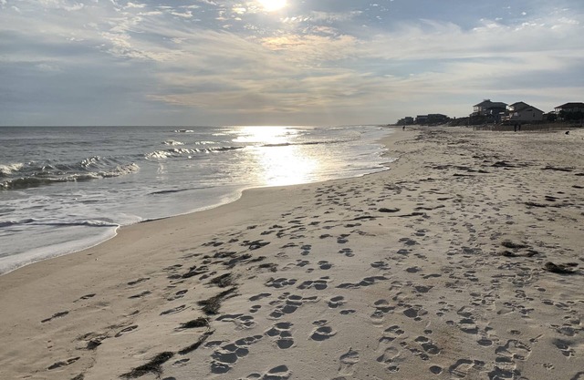 Beautiful St.George Island pool home, large patio pool surround & fire pit area.