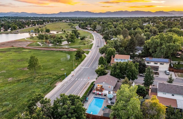 Best Home near Denver with Lake View & Heated Pool Open~Family~Peloton, 75" TV