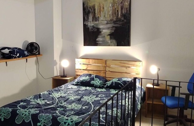 BLACK ESTUDIÓ INTERIOR DE UNA CASA COLONIAL