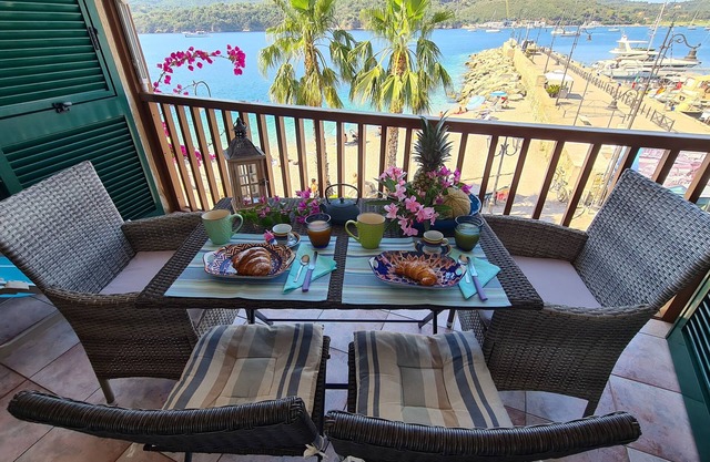 Blue harbor lovely apartment with terrace above the beach.