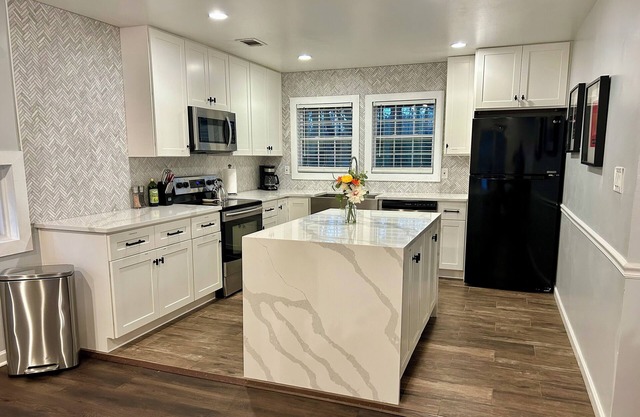 Brand new kitchen & main bathroom! Highly sought after 4bd,3ba near everything.
