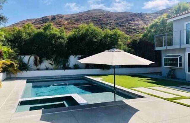 Bright and spacious home with views, pool & spa.