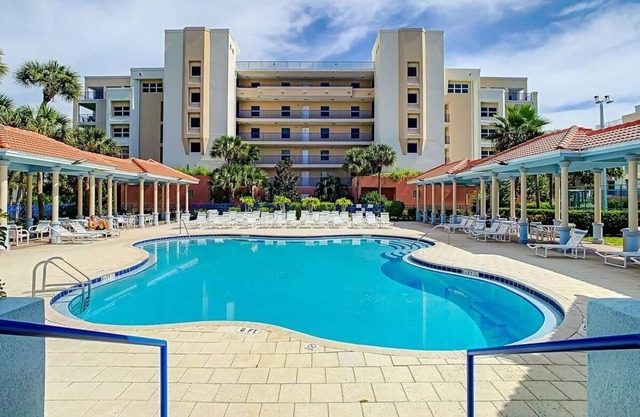 Build family memories at this 3BR condo in New Smyrna Beach, just steps across the street from the sand. Enjoy a pool & spa outside your door, a luxe master bath, spacious bedrooms, and resort-style amenities in a gated community.