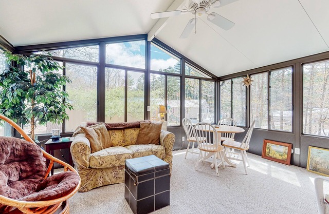 Calming dog-friendly lake view home with firepit, wood stove, patio, & gas grill