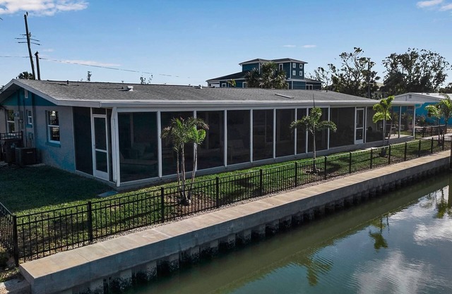Canal-Front Charmer with Private Beach Access!