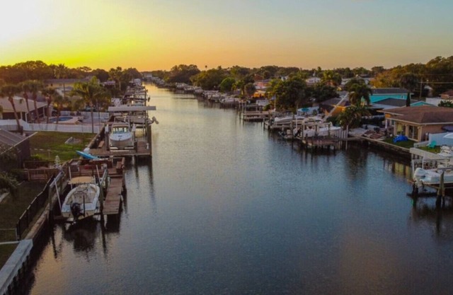 Canal views, dock, MANATEES, pool and more!