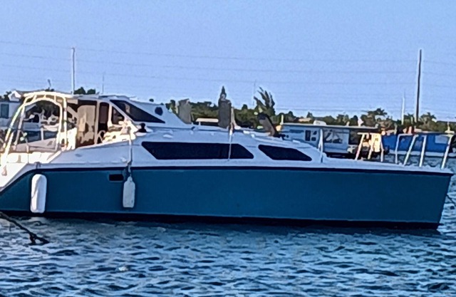 Catamaran with kayak