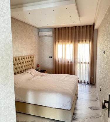 Chambre à Agdal Rabat dans un appartement partagé -king bed-