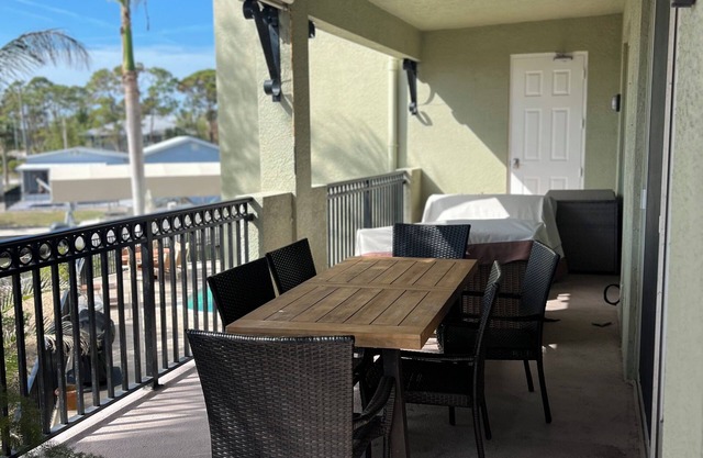 Charming 3-bedroom 2.5-bath condo on a canal with elevator and pool!