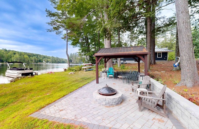 Charming apartment with waterfront access, modern comforts, and lakeside firepit