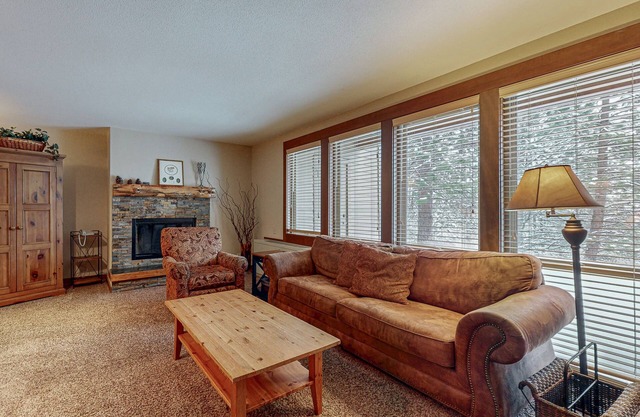 Charming condo with serene views, access to resort amenities, WiFi, and patio