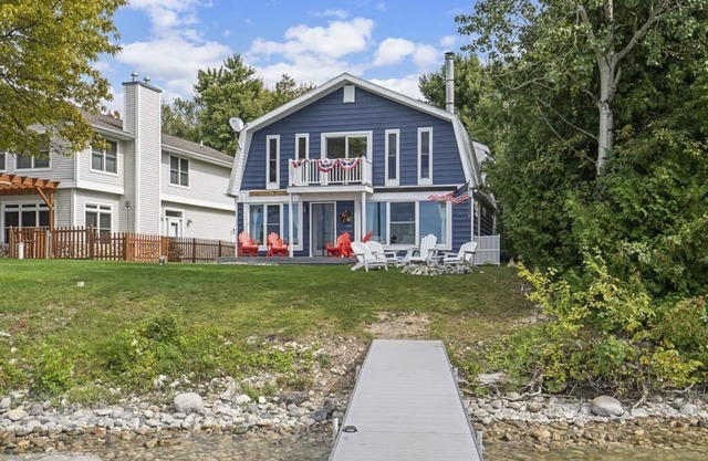 Charming newly updated 4 bedroom 2 full bath Burt Lake home