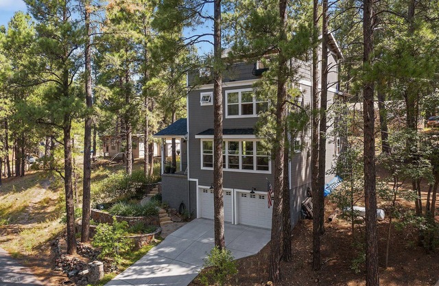 Chic home sleeps 9, has a hot tub, 3rd floor balcony, and EV Level 2 Charger