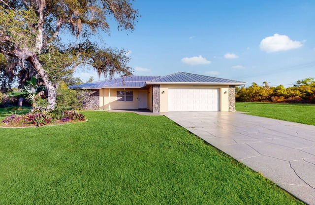 Classic home close to Lake Placid with modern updates, W/D, AC, & patio