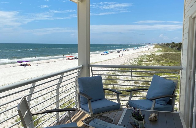 Closest to the sand and surf and no better view than Water’s Edge in the sand